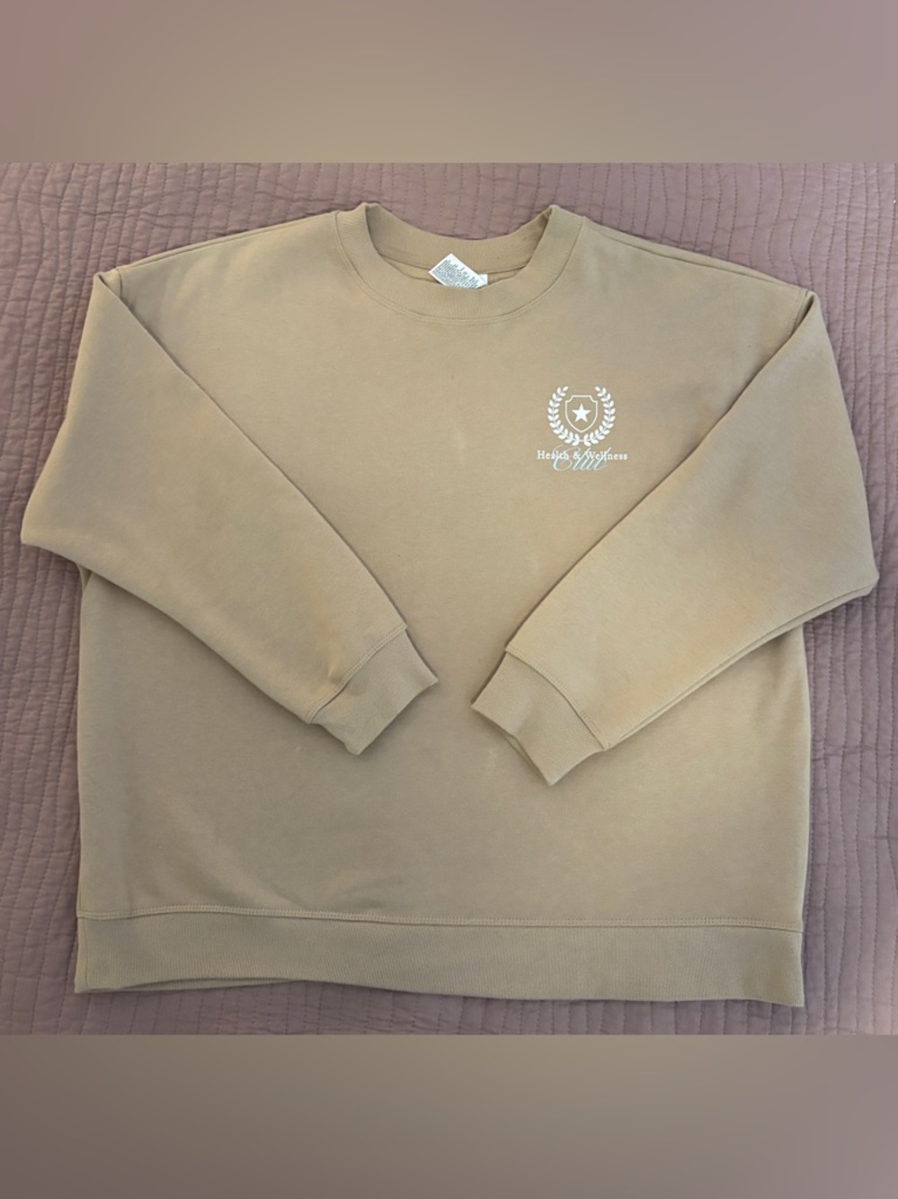 Tan Crewneck Sweatshirt with White and Blue Crest on front and Design on back
